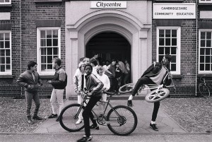Members of the Friday Club crowd around the entrance of the City Centre building as they wait for it to be opened in Peterborough, 1985. © Russell Boyce _ Museum of Youth Culture